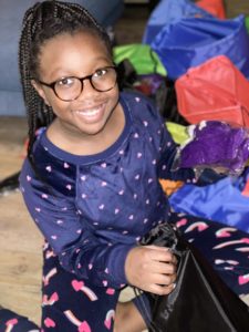 volunteer makes care packages for homeless people