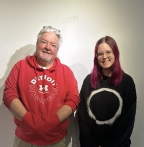 two people posing for a picture.