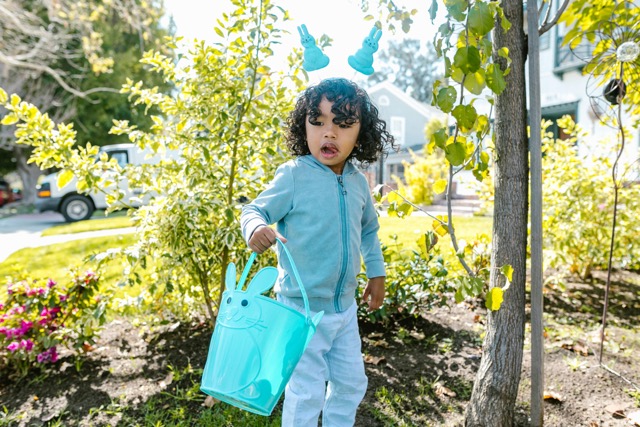 A child looking for Easter eggs.
