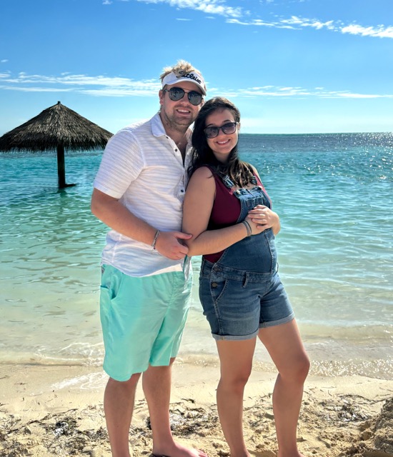 A couple by the beach.