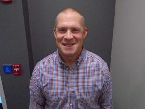 A portrait of a person smiling.