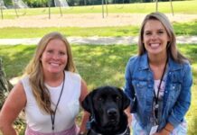 Tips on Handling Cyberbullying A photo of two people next to a dog.