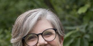 A photo of a person smiling.