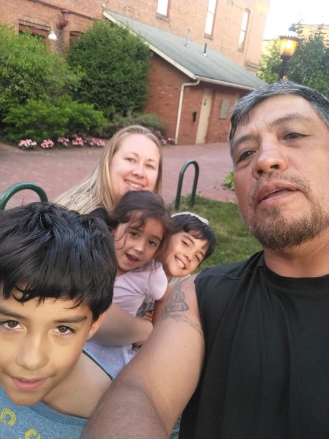 A family taking a picture.