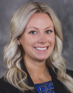 A photo of a person smiling.