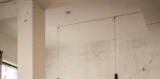 A sad child sitting with her parents.