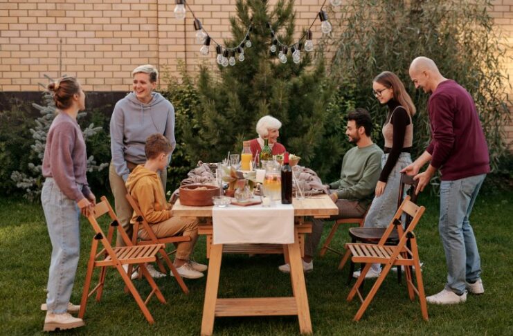 A family enjoying dinner outside