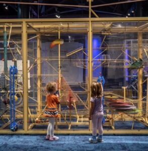 Children looking at a display at the Imagination Station