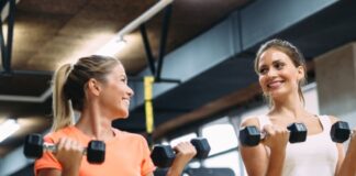 Two people doing curls