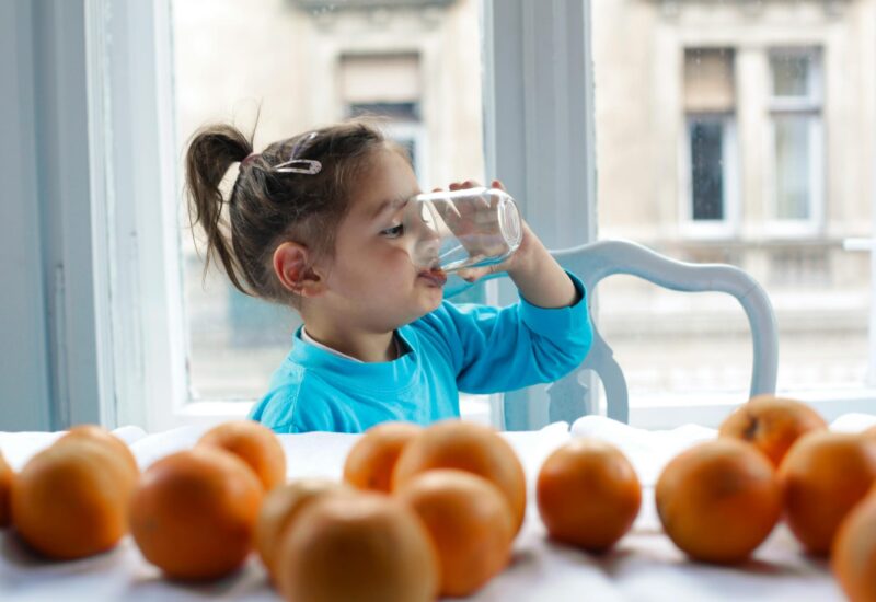Child drinking glass of water