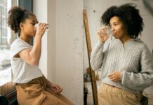Expert Tips to Keep Kids Hydrated in Summer Heat Mother and daughter drinking water
