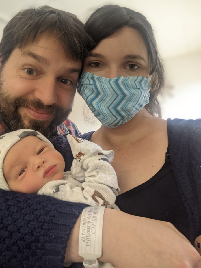 Parents with their newborn child