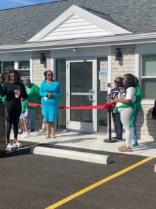 A grand opening at a building taking place.