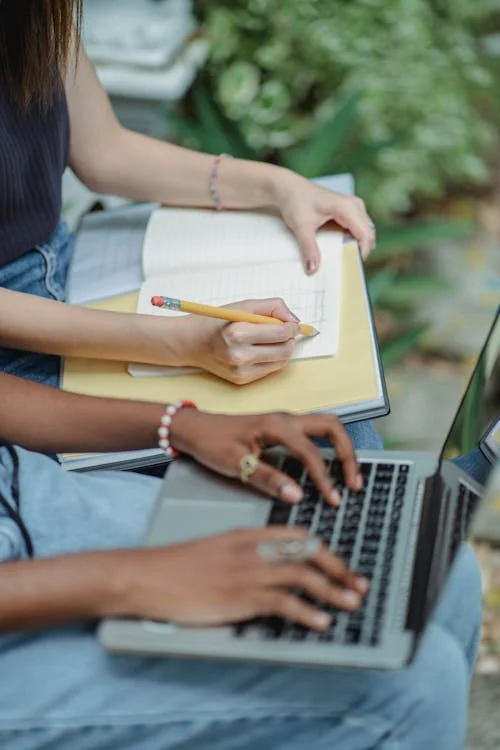 Students working on their computers.