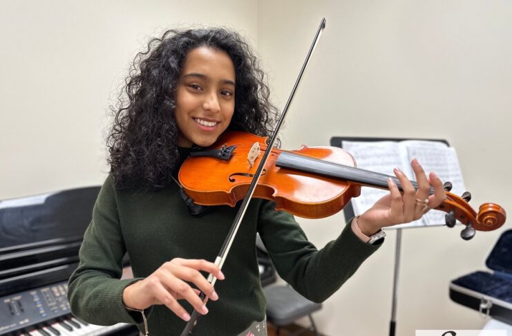 Student playing violin