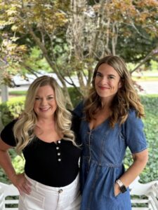 Two people standing together for a picture.