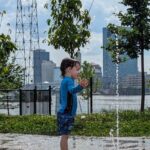 A photo of glass buildings in the background.