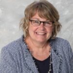 A person posing for a picture.