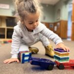 A child playing with a toy.