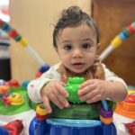 A child playing with a toy.