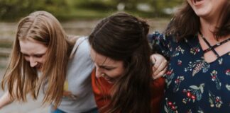 Teens laughing together