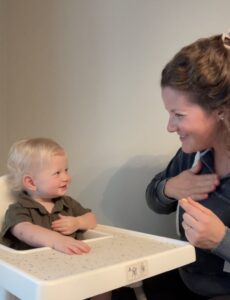 Mom and baby signing