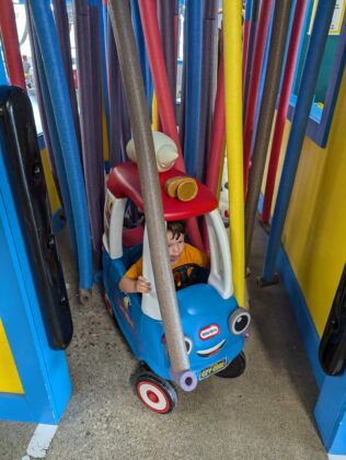 Toy car in fake car wash