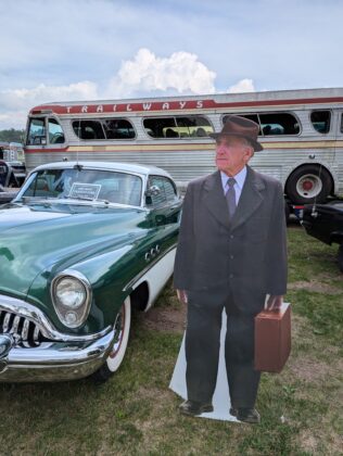 Old car and cardboard cutout