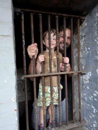 Boy in pretend jail
