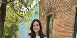 Woman pushing baby in stroller