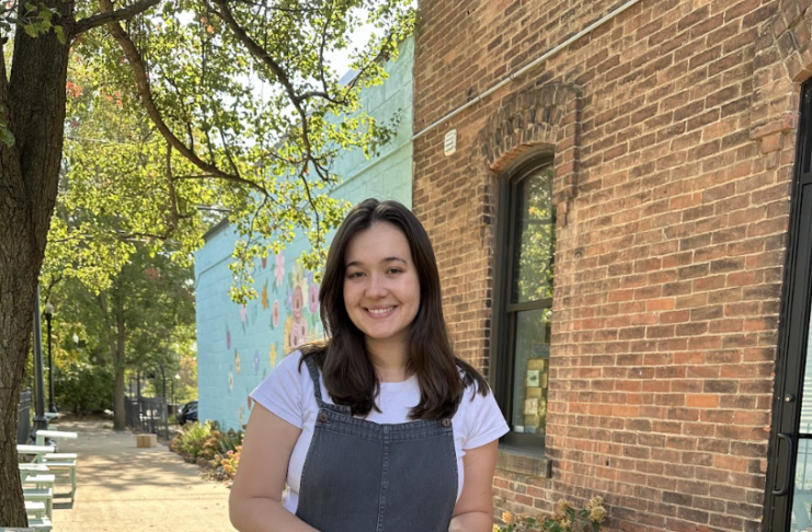 Woman pushing baby in stroller