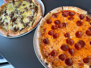 Two wood fired pizzas