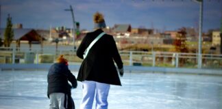 adult and kid skating