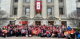 Group in front of building