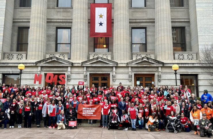 Group in front of building