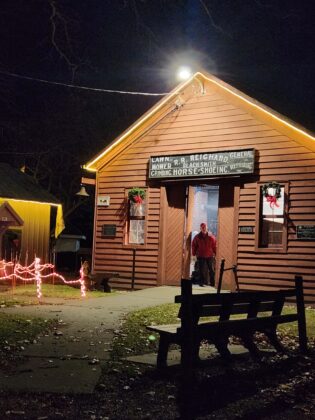 Cabin at nighttime lit up
