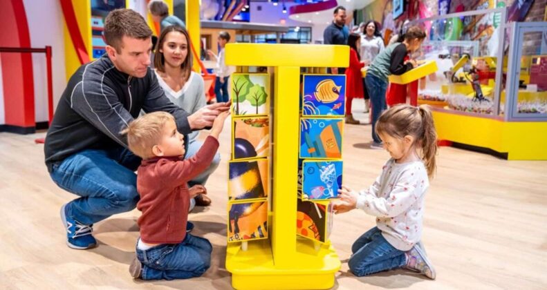 Kids playing with yellow toy