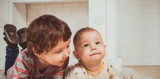 older brother with baby sibling