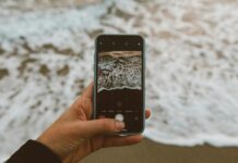 iphone taking picture of shore