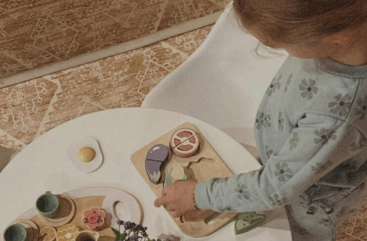 Child doing Montessori-based play