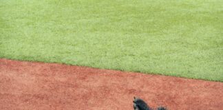 baseball and glove on diamond