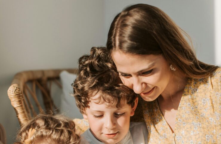 Mother and children reading