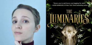 Susan Dennard next to the cover of her book, The Luminaries.